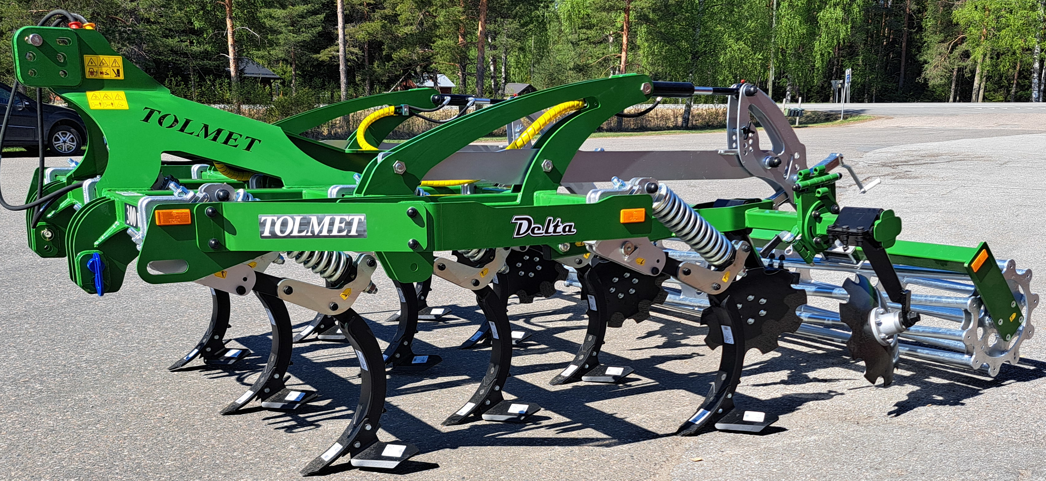 Delta 300 Hydraulinen hanhenjalkamuokkain pakkerilla
